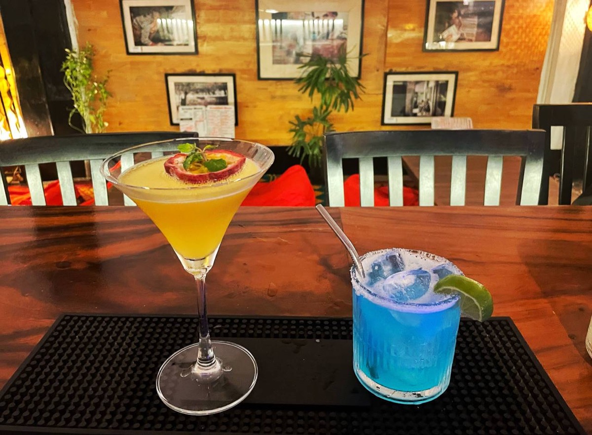 Two cocktails on the bar at Pomme Battambang